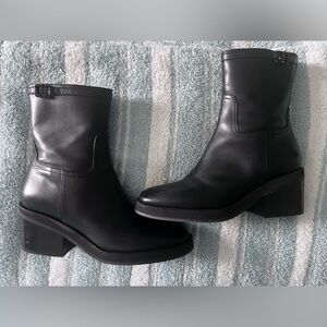 Jimmy Choo Black Heeled Boots Sleek Leather Design